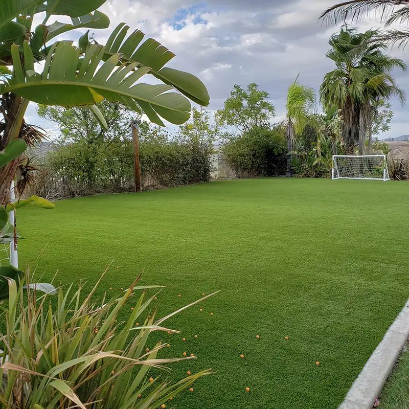Artificial grass backyard play field installation in Murrieta, CA